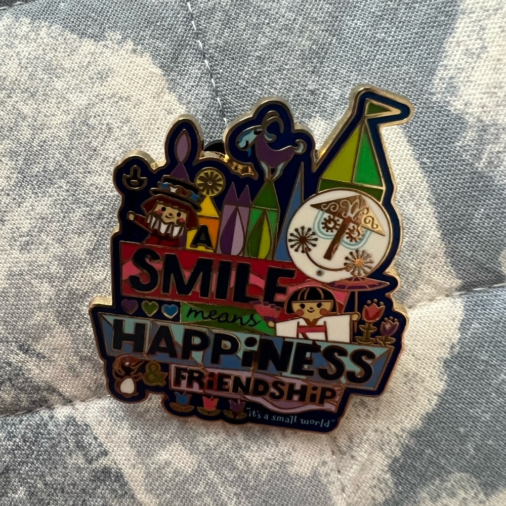 it's a small world pin